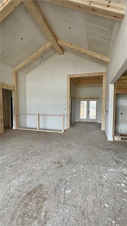 20840 Golden Rd, Linwood, KS 66052 - spare room with high vaulted ceiling and french doors