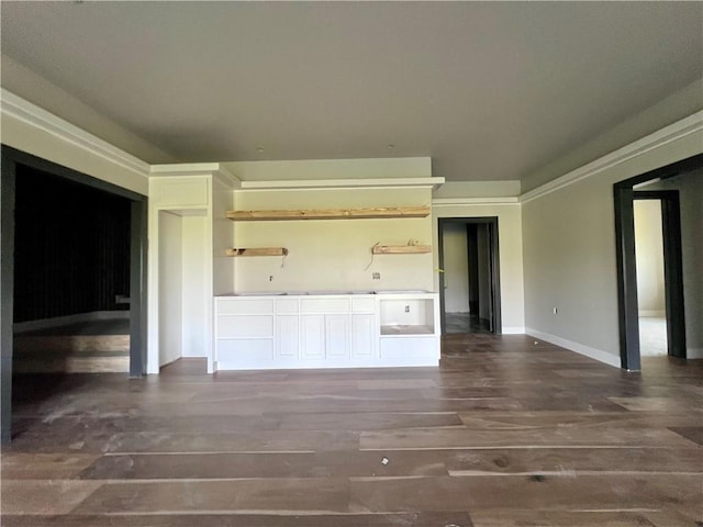 20840 Golden Rd, Linwood, KS 66052 - unfurnished living room with wood finished floors and baseboards
