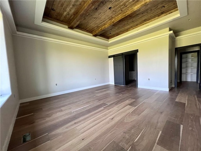 20840 Golden Rd, Linwood, KS 66052 - empty room featuring a raised ceiling, wooden ceiling, and wood finished floors