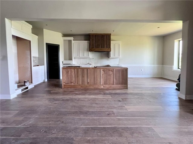 20840 Golden Rd, Linwood, KS 66052 - kitchen with wood finished floors, white cabinetry, a center island, and open floor plan