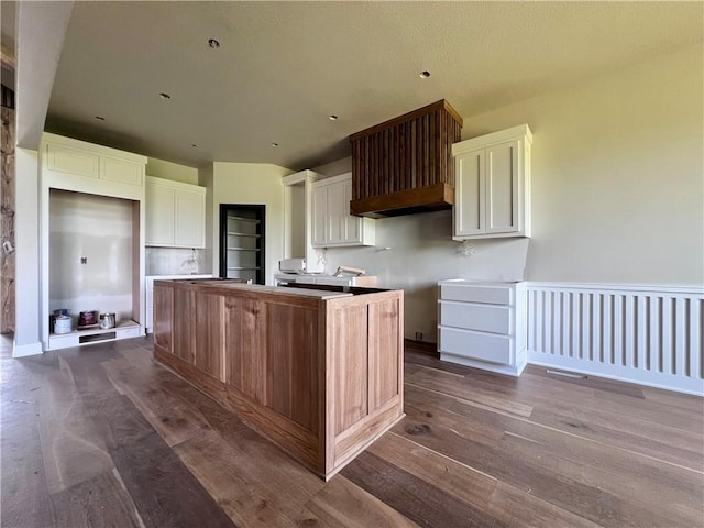 20840 Golden Rd, Linwood, KS 66052 - kitchen featuring dark wood finished floors, a kitchen island, and white cabinetry