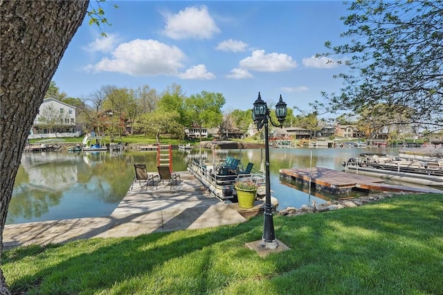 62 Beach Dr, Lake Tapawingo, MO 64015 - dock with a water view and a yard