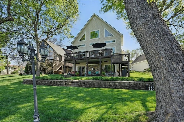 62 Beach Dr, Lake Tapawingo, MO 64015 - back of property with stairway, a deck, a ceiling fan, a yard, and a patio area