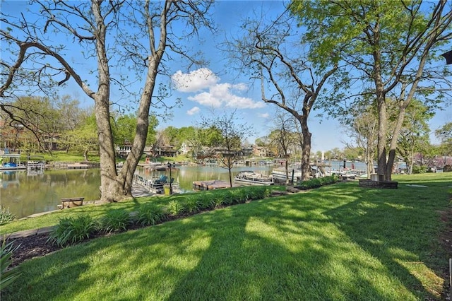 62 Beach Dr, Lake Tapawingo, MO 64015 - view of green lawn with a water view