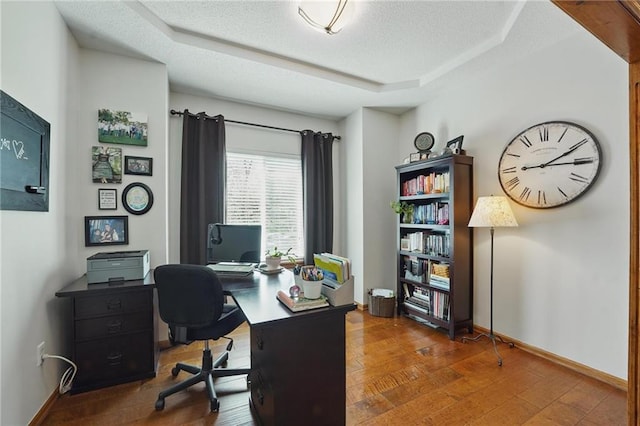 62 Beach Dr, Lake Tapawingo, MO 64015 - office space featuring a raised ceiling, a textured ceiling, baseboards, and wood finished floors