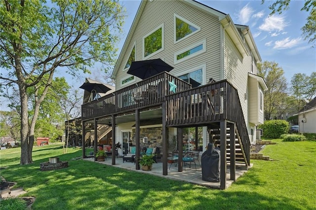 62 Beach Dr, Lake Tapawingo, MO 64015 - rear view of house featuring stairs, a deck, a patio area, and a lawn