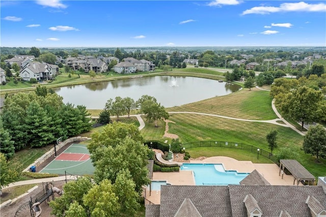 birds eye view of property with a residential view and a water view