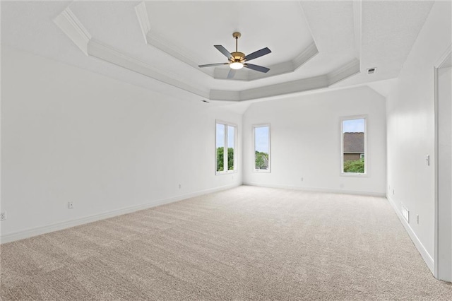 14215 W 157th Ter, Olathe, KS 66062 - empty room with light colored carpet, a raised ceiling, ceiling fan, ornamental molding, and baseboards