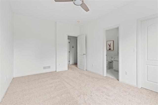 14215 W 157th Ter, Olathe, KS 66062 - unfurnished bedroom with carpet floors, connected bathroom, baseboards, and ceiling fan