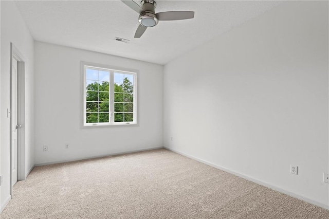 14215 W 157th Ter, Olathe, KS 66062 - unfurnished room featuring light carpet, ceiling fan, and baseboards