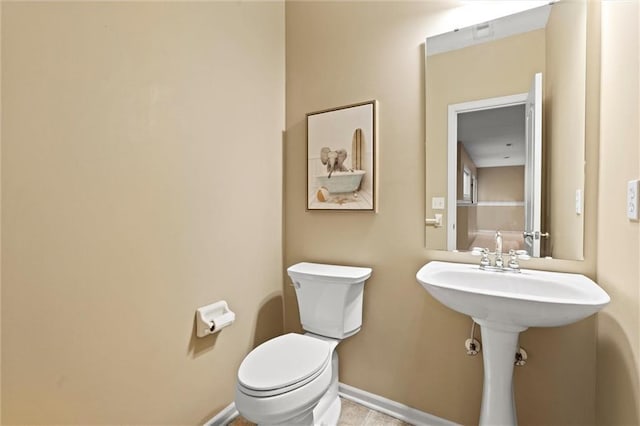 14215 W 157th Ter, Olathe, KS 66062 - bathroom with toilet and baseboards