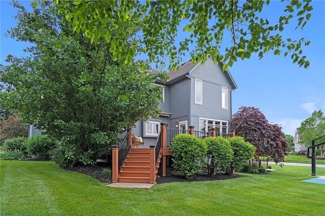 14215 W 157th Ter, Olathe, KS 66062 - back of property featuring stairs, a lawn, and a deck
