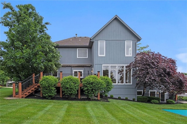 14215 W 157th Ter, Olathe, KS 66062 - rear view of property with a yard, stairs, a wooden deck, and roof with shingles