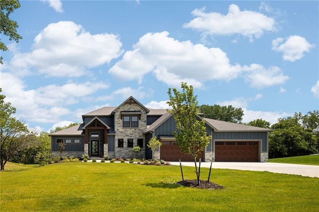 17894 169th St, Basehor, KS 66007 - craftsman inspired home featuring stone siding, board and batten siding, concrete driveway, a front lawn, and an attached garage