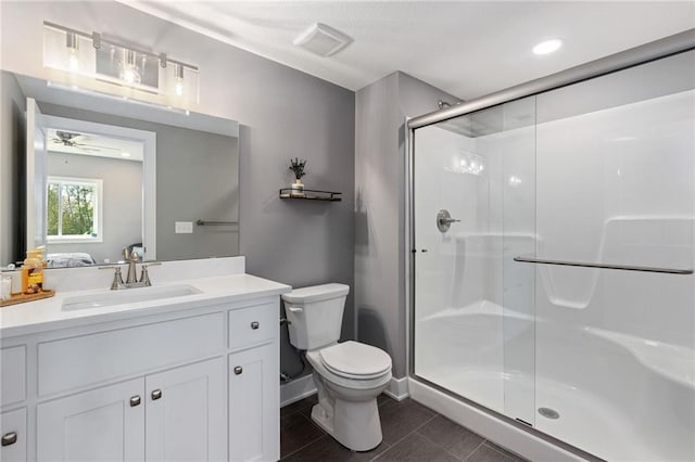 17894 169th St, Basehor, KS 66007 - bathroom with a shower stall, vanity, and a ceiling fan