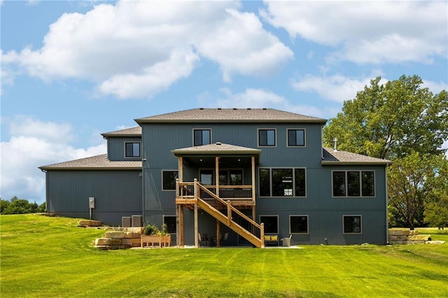 17894 169th St, Basehor, KS 66007 - back of house with stairs, roof with shingles, a yard, and a deck