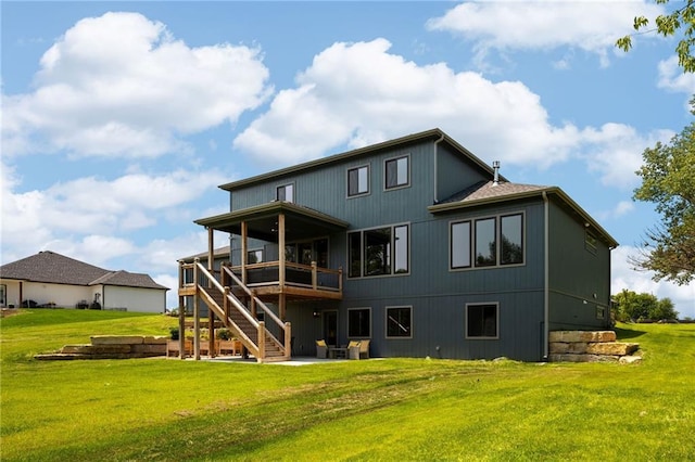 17894 169th St, Basehor, KS 66007 - rear view of house with a lawn, stairs, a wooden deck, and a patio area