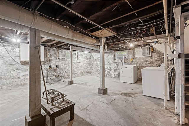basement featuring washing machine and dryer