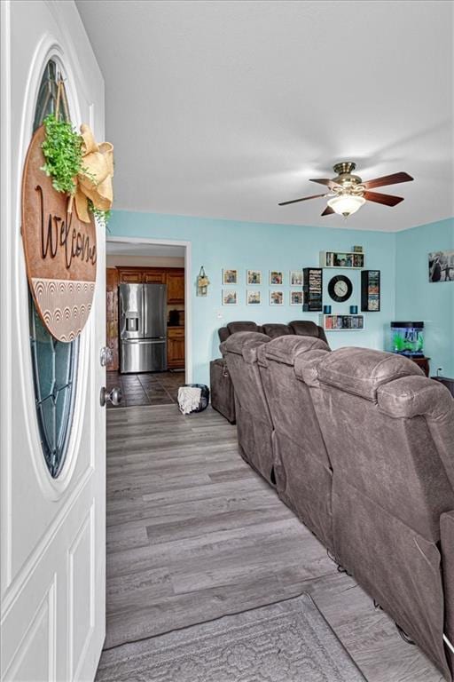 204 Lynn St, Lathrop, MO 64465 - living room with a ceiling fan and light wood finished floors