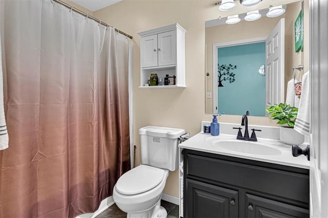 204 Lynn St, Lathrop, MO 64465 - bathroom with toilet, vanity, and a shower with shower curtain