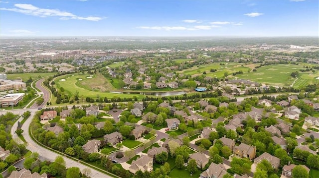 aerial view featuring a water view, golf course view, and a residential view
