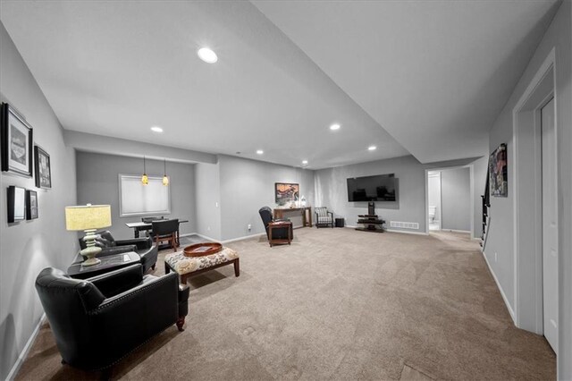carpeted living room featuring recessed lighting, baseboards, and visible vents
