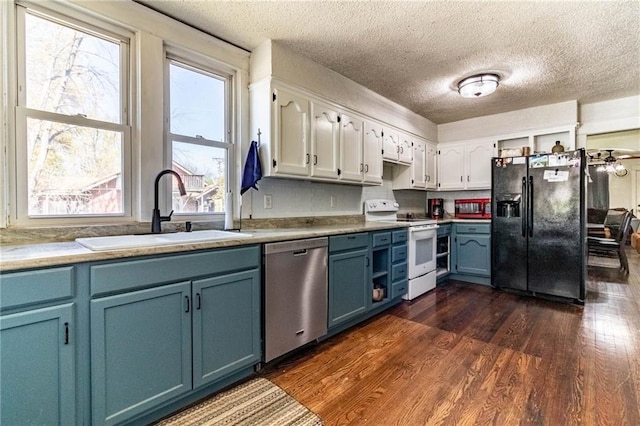 401 E Jackson St, Windsor, MO 65360 - kitchen featuring a sink, black fridge with ice dispenser, dishwasher, dark wood-type flooring, and white electric stove