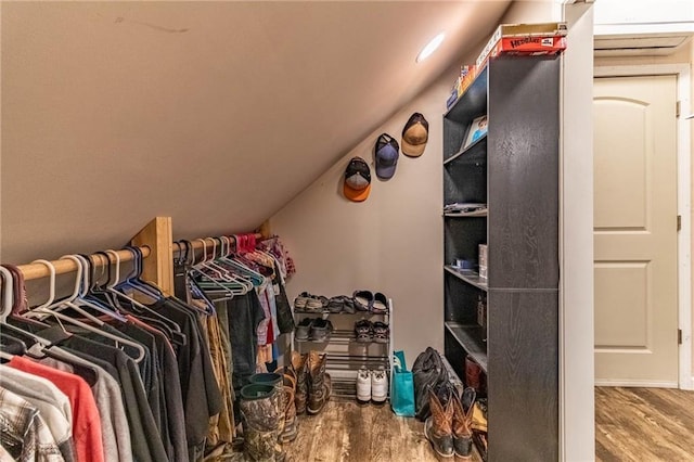 401 E Jackson St, Windsor, MO 65360 - spacious closet with lofted ceiling and wood finished floors
