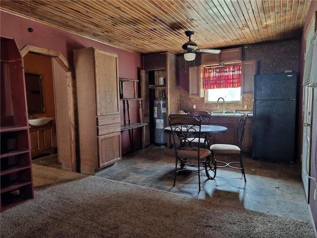 dining area featuring wood ceiling, a ceiling fan, and electric water heater