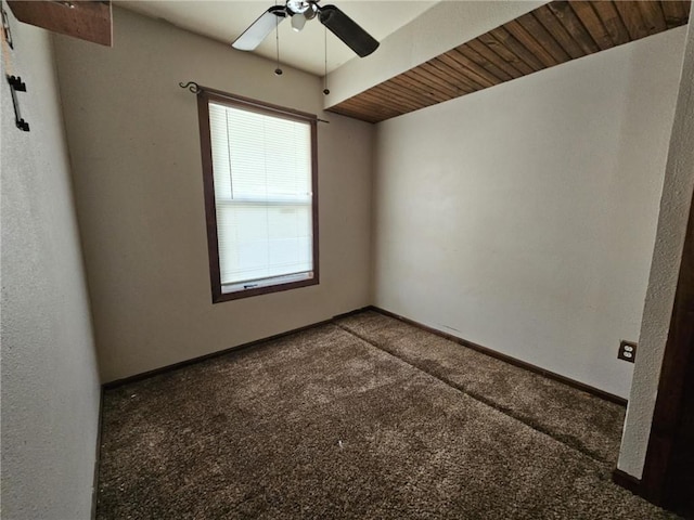 unfurnished room featuring ceiling fan, carpet floors, and baseboards