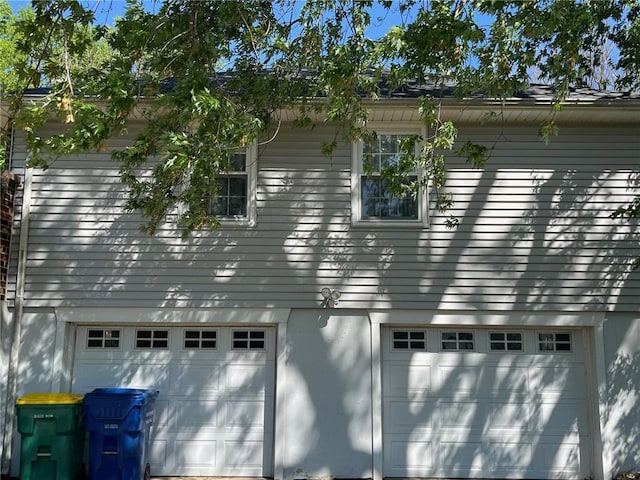 view of property exterior with a garage