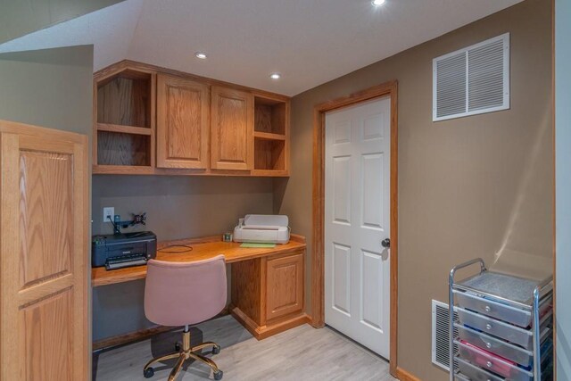 14108 Pine Valley Ct, Basehor, KS 66007 - office space featuring built in desk, light wood-style flooring, and recessed lighting