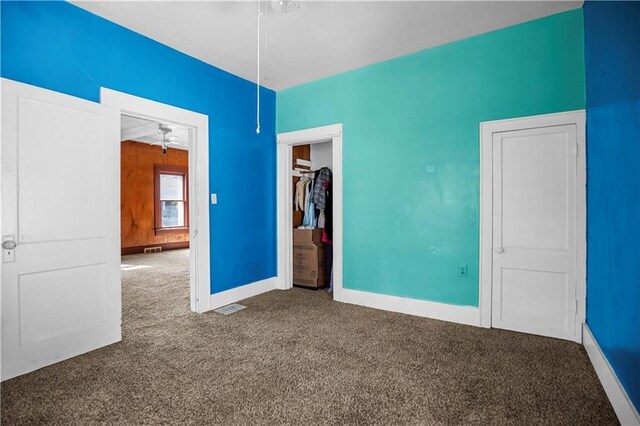 707 E 8th St, Trenton, MO 64683 - spare room with ceiling fan, baseboards, carpet flooring, and visible vents