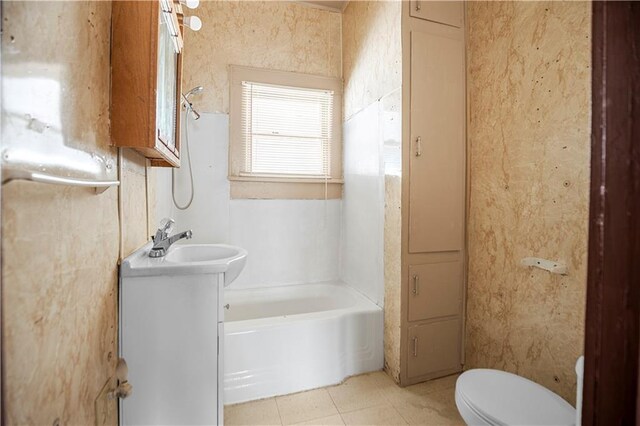 707 E 8th St, Trenton, MO 64683 - bathroom with tile patterned flooring, toilet, and vanity