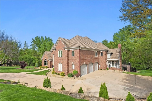view of property exterior featuring concrete driveway, a lawn, an attached garage, and a chimney
