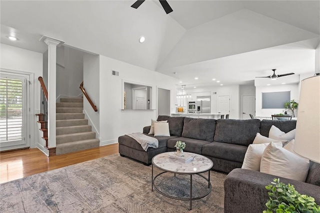 living room featuring recessed lighting, a ceiling fan, stairs, and wood finished floors
