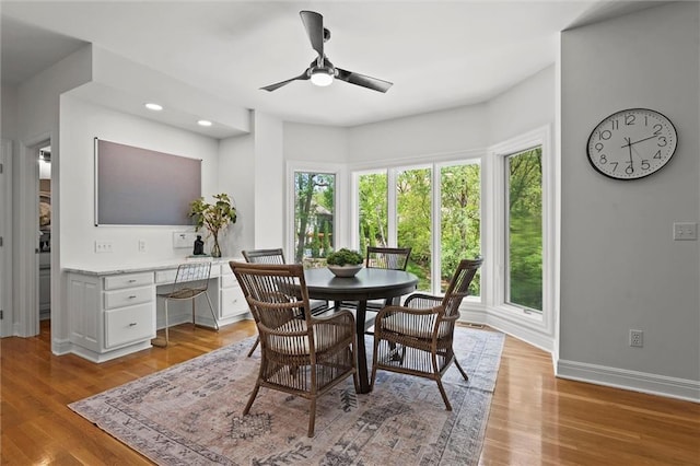 dining room featuring recessed lighting, baseboards, ceiling fan, and light wood-type flooring
