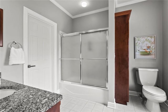 bathroom featuring tile patterned flooring, crown molding, toilet, and vanity