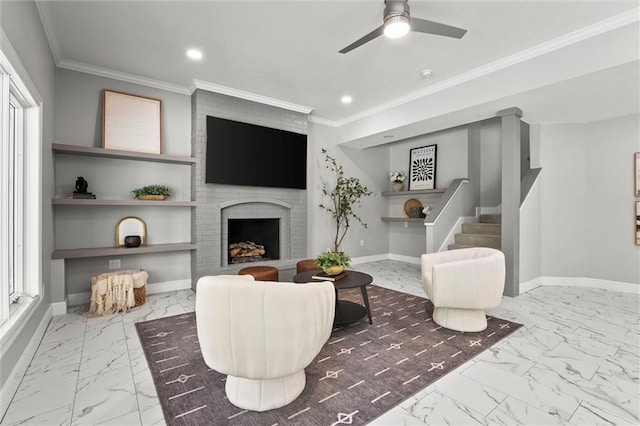 living area featuring crown molding, ceiling fan, recessed lighting, and marble finish floor