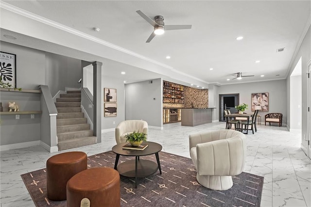 living area with a ceiling fan, recessed lighting, stairs, and marble finish floor