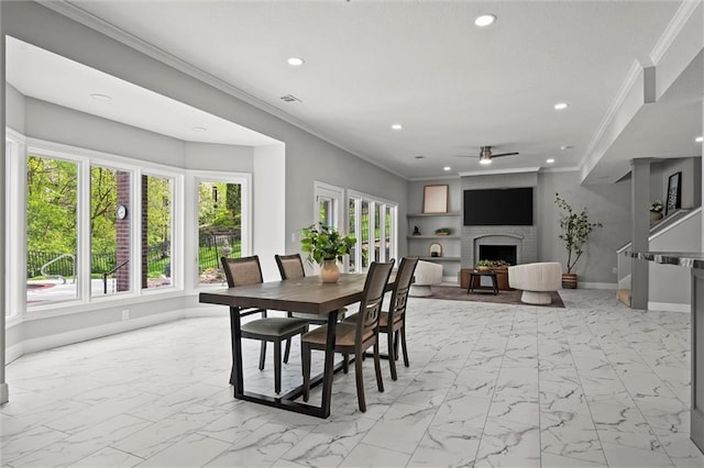 dining space with crown molding, recessed lighting, and marble finish floor