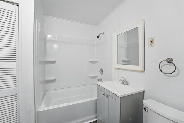 full bath with toilet, vanity, and shower / washtub combination