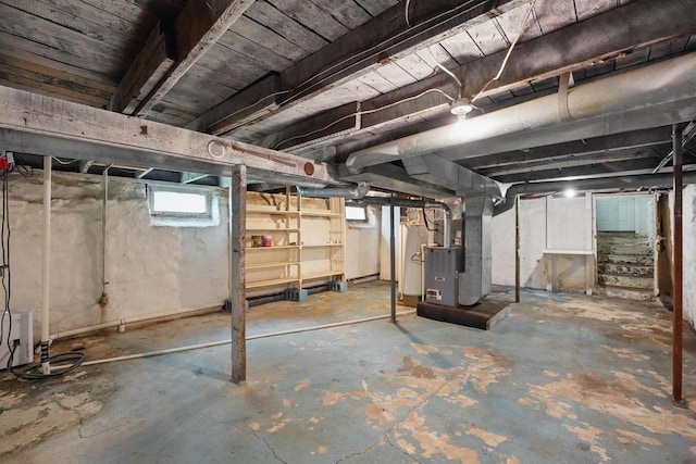 below grade area featuring heating unit