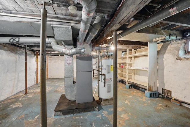 unfinished basement featuring water heater and heating unit