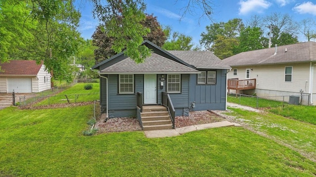 view of front facade with board and batten siding, cooling unit, roof with shingles, and a porch