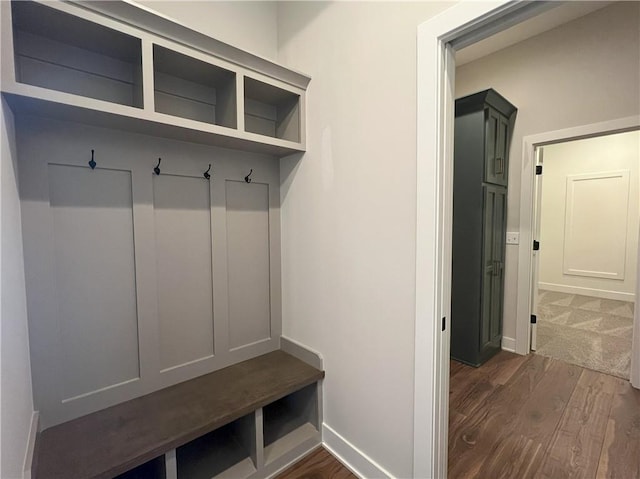 24919 W 145th St, Olathe, KS 66061 - mudroom featuring baseboards and dark wood-type flooring