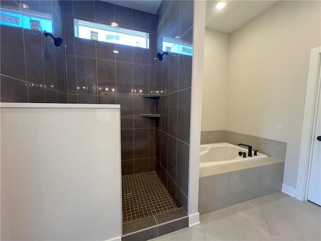 24919 W 145th St, Olathe, KS 66061 - bathroom featuring a bath, walk in shower, and baseboards