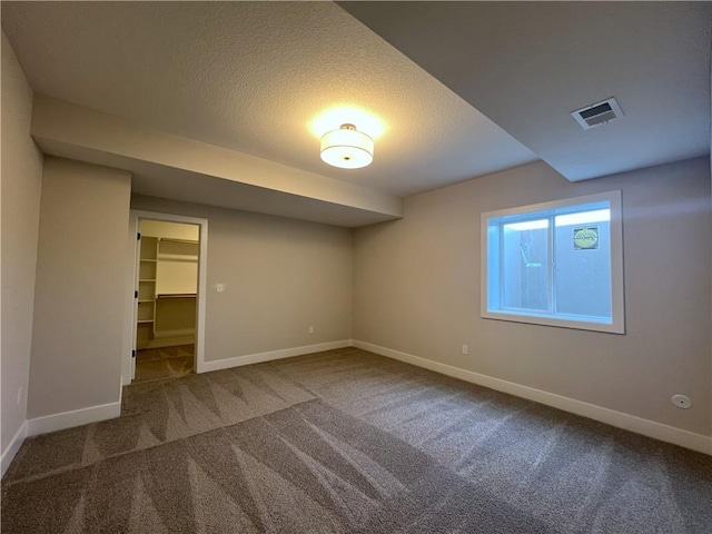 24919 W 145th St, Olathe, KS 66061 - carpeted spare room featuring baseboards and a textured ceiling