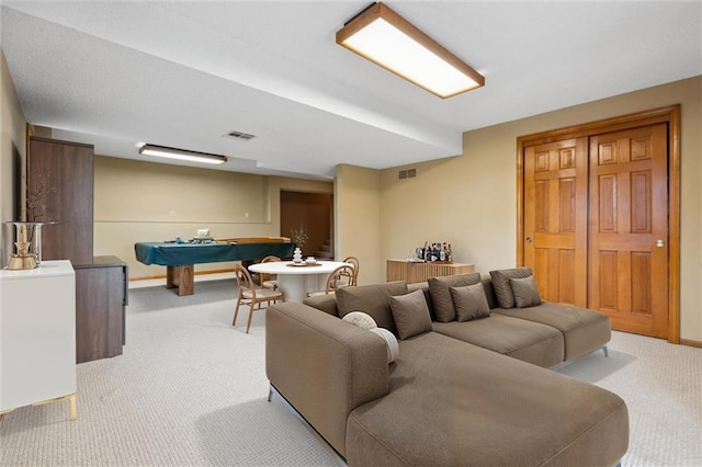 living room with baseboards, light colored carpet, billiards, and visible vents