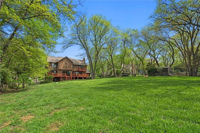view of yard with a deck